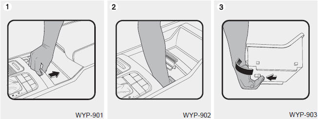 Kia Carnival: Center console storage Kia Carnival: Center console storage. ➀ Pull down the knob to slide the sliding tray.