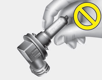 Kia Carnival: Front light bulb replacement Kia Carnival: Front light bulb replacement.